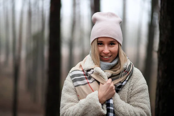 Winter picnic in forest. Portrait butiful girl in winter foggy forest. valentines concept. cloudy foggy day in forest. Place for text