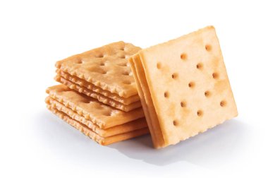 Beyaz arka planda izole edilmiş lezzetli bisküviler.