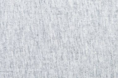 Heather Grey 'in sentetik liflerden örülmüş kumaşının detaylarını görmek için yakın çekim. soyut duvar kağıdı giysileri ya da metin için kopyalama alanı olan yumuşak tekstil.