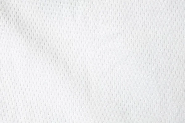 白いメッシュジャージー生地の背景 運動用の布のスポーツウェアのテクスチャ 軽量で空気の流れが良く 涼しくて汗から乾燥しやすい テキストのためのコピースペースを持つ抽象的な壁紙 — ストック写真