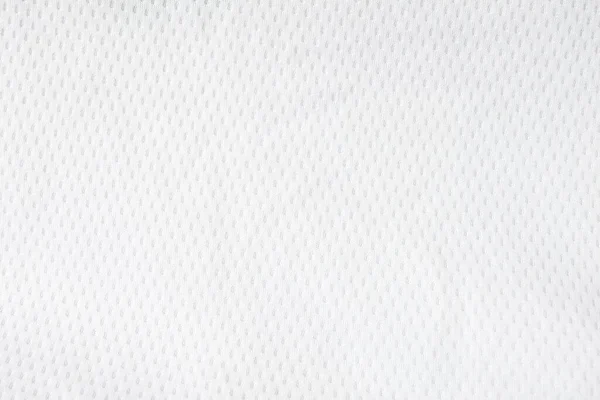 白いメッシュジャージー生地の背景 運動用の布のスポーツウェアのテクスチャ 軽量で空気の流れが良く 涼しくて汗から乾燥しやすい テキストのためのコピースペースを持つ抽象的な壁紙 — ストック写真