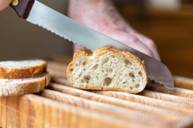 fresh bread cut with knife