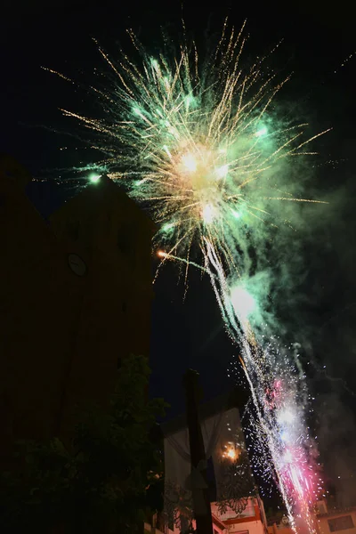 Fireworks over the church on a summer night, Colors of fire