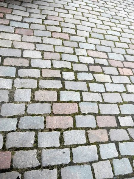 Strada Della Città Pavimentata Con Ciottoli Colorati Pavimentazione Alla Luce — Foto Stock