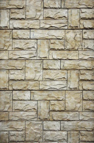the house wall is an imitation of white stone masonry. background.