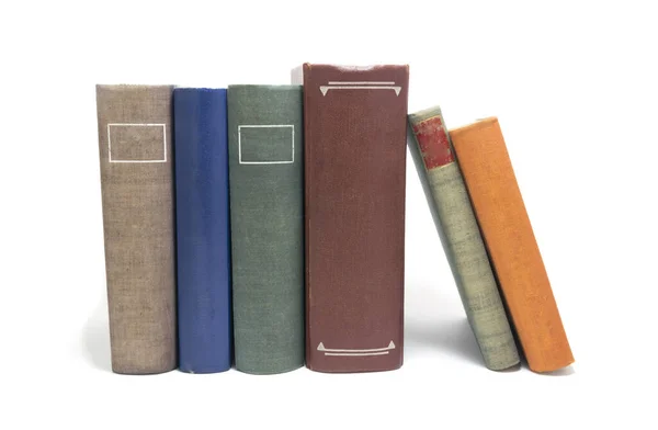 multi yığını üzerinde beyaz izole kitap renkli.