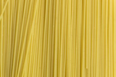 Arka plan dokusu ve tam çerçeve formatında haşlanmış yumurta erişte veya spagetti makarna deseni. Yukarıdan görüntüle. Close