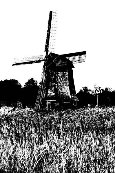 Wiatrak holenderski sylwetka — Zdjęcie stockowe