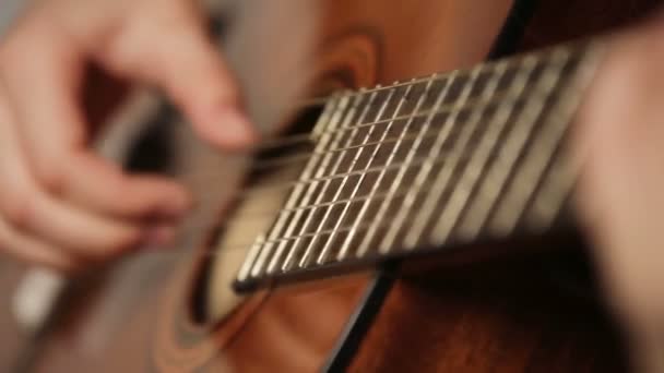 Womans hands playing acoustic guitar — Stock Video