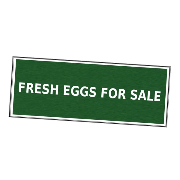 Frische Eier zum Verkauf weiße Aufschrift auf Bilderrahmen grünen Hintergrund — Stockfoto