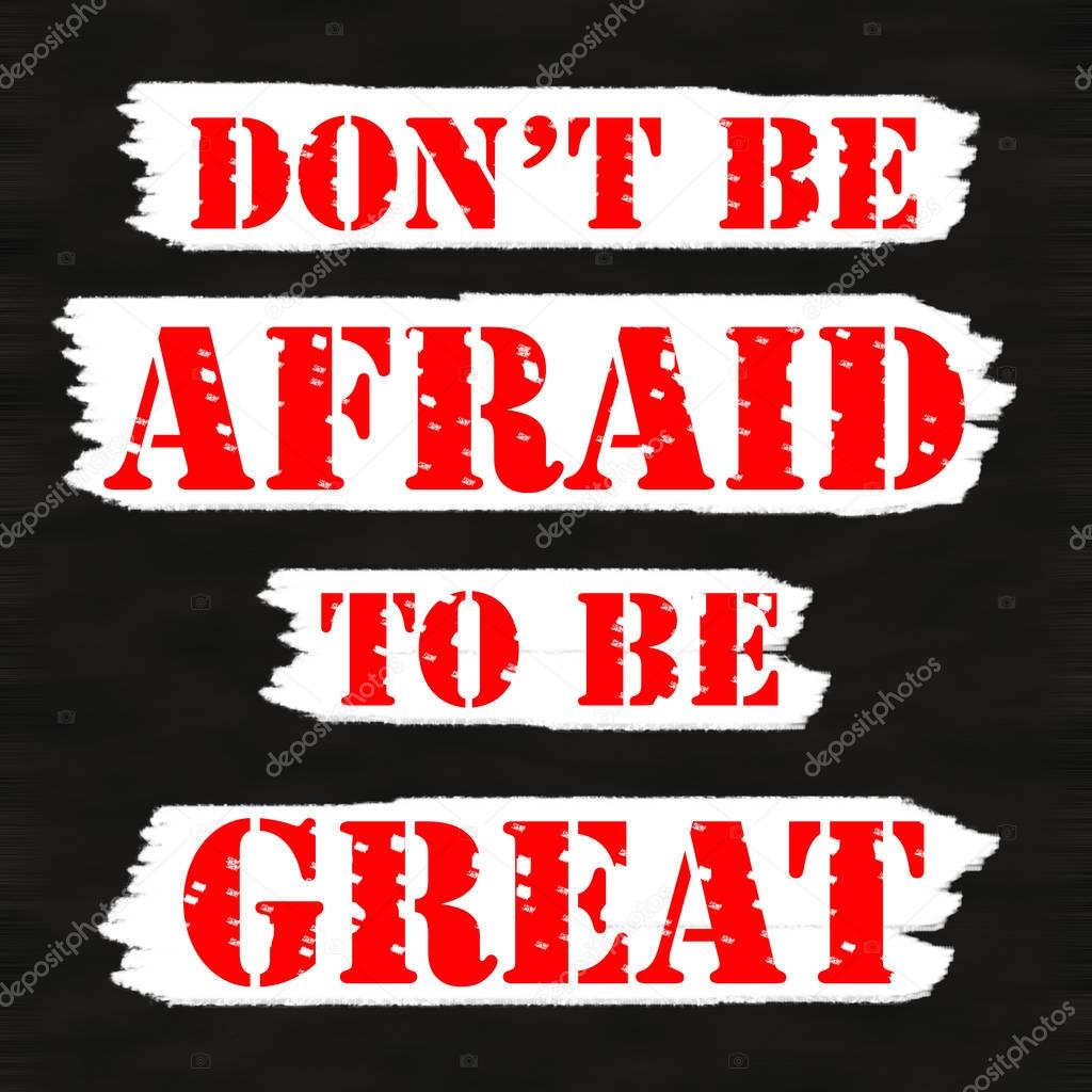 Don't be afraid to be great.Creative Inspiring Motivation Quote Concept Red Word On Black wood Background.