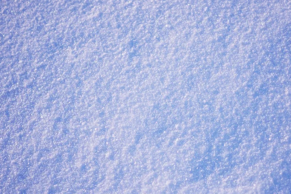 De textuur van de sneeuw in de winter. — Stockfoto