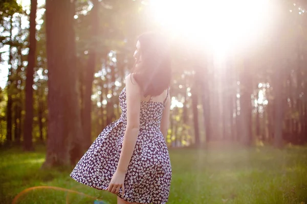 Young beautiful woman in park. Nature — Stock Photo, Image