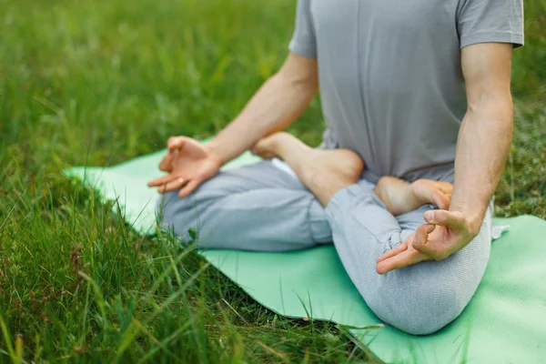 Concept of meditation in nature. Man in a lotus pose — Stock Photo, Image