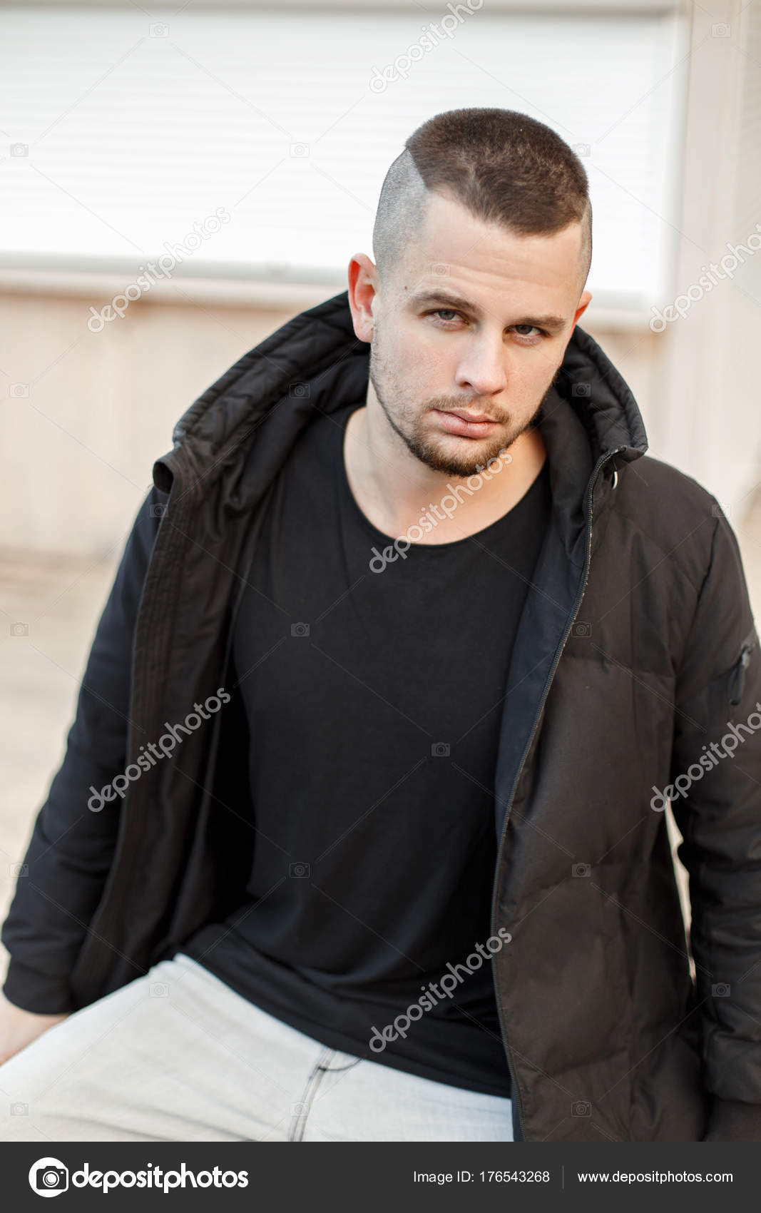 Handsome caucasian white male with black short hair and stubble with blue t  shirt, tongue sticking out Stock Photo | Adobe Stock