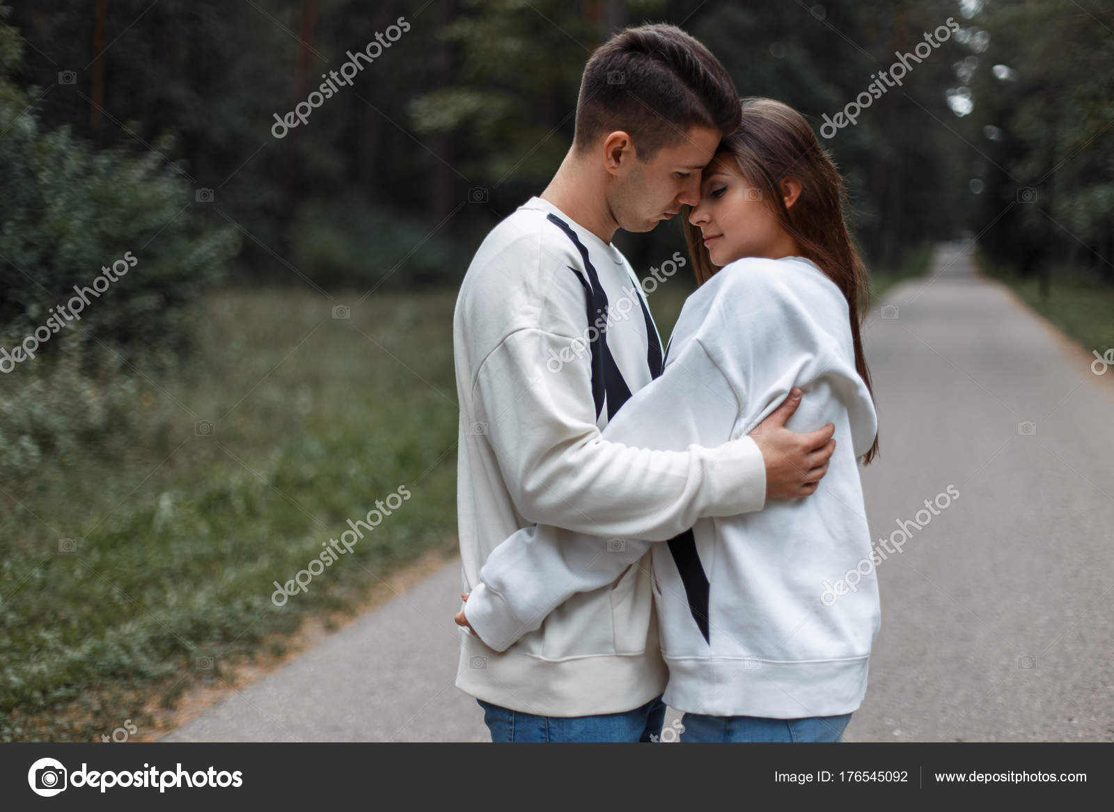 Young Couple In Love Hug Each Other On The Nature Background Stock Photo Image By C Alonesdj Young Couple In Love Hug Each Other On The Nature Background Stock Photo Image By C Alonesdj