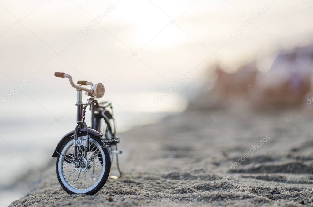 toy bicycle on beach for holiday and relax time