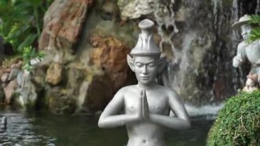 Çarpılmış münzevi egzersiz taş heykel, çeşitli duruş egzersiz iyi sağlık için