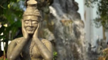 Çarpılmış münzevi egzersiz taş heykel, çeşitli duruş egzersiz iyi sağlık için