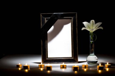 Blank mourning frame for sympathy card on dark background clipart