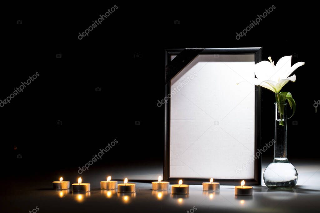 Blank mourning frame for sympathy card on dark background