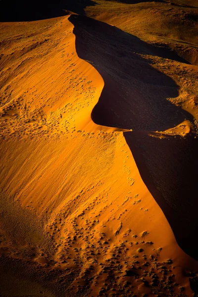 Sand dunes of Namib desert from aircraft on Skeleton coast in Namibia. — Stock Photo, Image