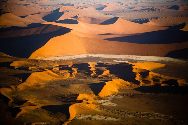 Sand dunes of Namib desert from aircraft on Skeleton coast in Namibia. — Stock Photo, Image