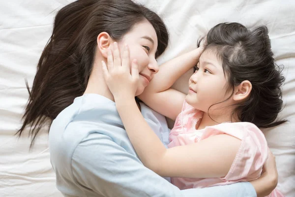 Mother Her Daughter Child Girl Hugging Stroking Her Mom Bedroom — Stock Photo, Image