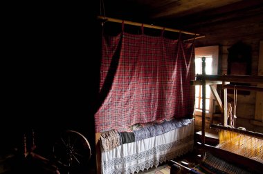 Old Russian ancient medieval bedroom in a wooden hut. clipart