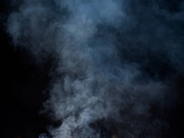 Puffs Smoke Dark Background Highlighted Blue Studio Photography — Stock Photo, Image