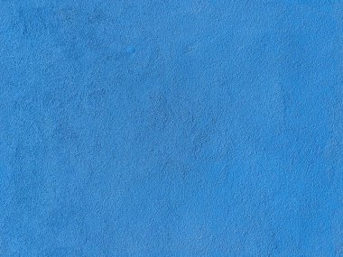 Kusursuz bir doku. Sıvalı duvar mavi boyayla boyanmış. Sert yüzey