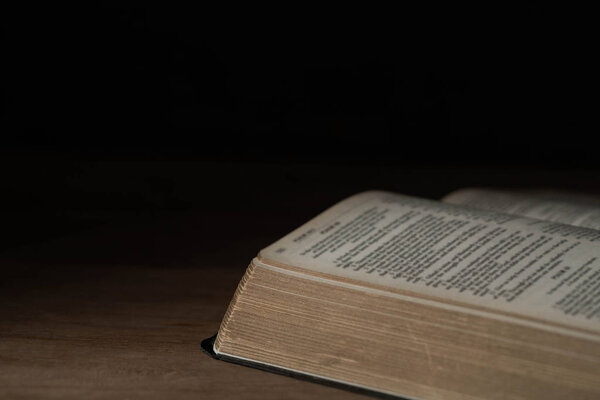 Bible on wooden background