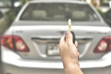 Uzaktan kumandalı araba alarmının seçici odak noktasında. Vintage tonlama işlendi.