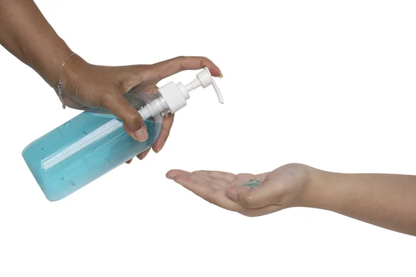 Alkol jeli. Elinde dezenfektanla elini temizliyor. Mikropların ve bakterilerin yayılmasını önler ve enfeksiyonların Coronavirüs kavramını ortadan kaldırır..