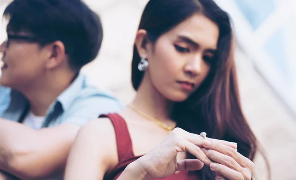 Closeup Sad Wife Want Divorce Lamenting Holding Wedding Ring Blurred — Stock Photo, Image