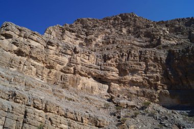 Muhteşem bir dağ manzarası. Dağlarda bitki örtüsü yok. Al Hajar Dağları, Umman..