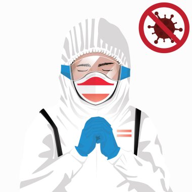 Covid-19 veya Coronavirus konsepti. Avusturya sağlık personeli koruyucu giysiler içinde maske takıyor ve Avusturya 'da Covid-19 virüs salgınına karşı dua ediyor. Avusturyalı adam ve Avusturya bayrağı. Salgın Korona Virüsü