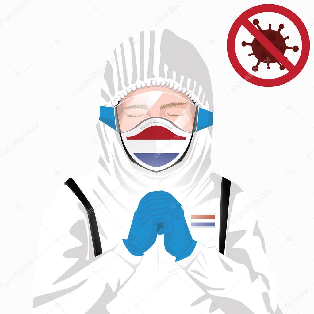 Covid-19 or Coronavirus concept. Dutch medical staff wearing mask in protective clothing and praying for against Covid-19 virus outbreak in Holland. Dutch man and Netherlands flag. Epidemic corona virus