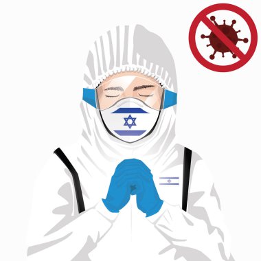 Covid-19 veya Coronavirus konsepti. İsrail sağlık personeli koruyucu giysiler içinde maske takıyor ve İsrail 'de Covid-19 virüsü salgınına karşı dua ediyor. İsrailli adam ve İsrail bayrağı. Salgın Korona Virüsü