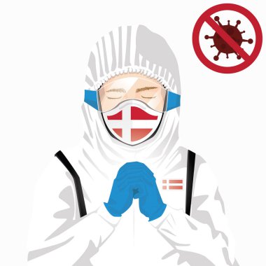 Covid-19 veya Coronavirus konsepti. Danimarka sağlık personeli koruyucu giysiler içinde maske takıyor ve Danimarka 'da Covid-19 virüs salgınına karşı dua ediyor. Danimarkalı ve Danimarka bayrağı. Pandemik korona virüsü