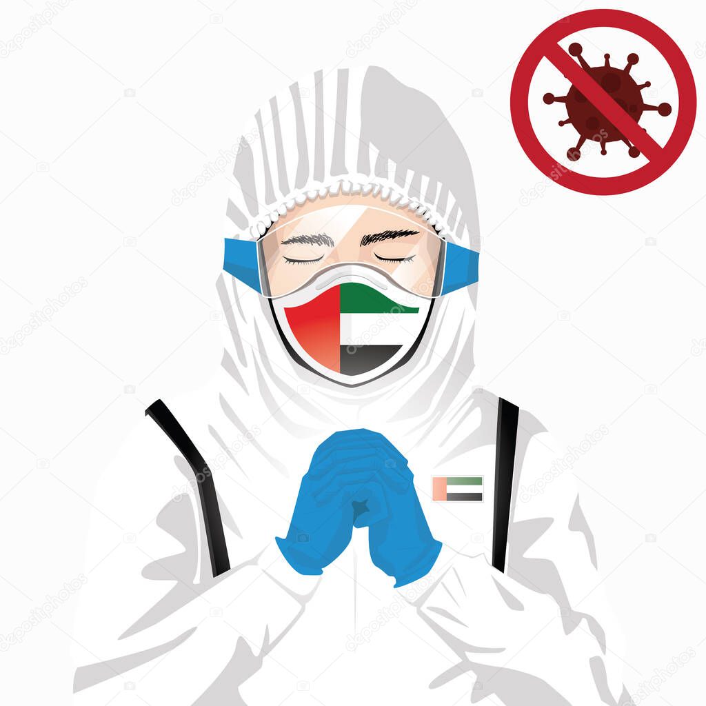 Covid-19 or Coronavirus concept. Arabian medical staff wearing mask in protective clothing and praying for against Covid-19 virus outbreak in United Arab Emirates. Arabian man and UAE flag. Pandemic corona virus