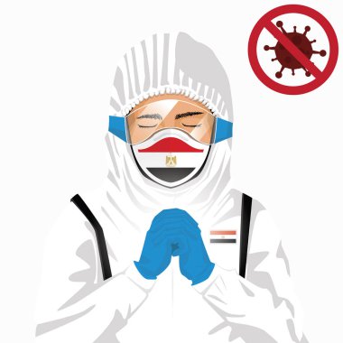 Covid-19 veya Coronavirus konsepti. Mısır sağlık personeli koruyucu giysiler içinde maske takıyor ve Mısır 'da Covid-19 virüsüne karşı dua ediyor. Mısırlı adam ve Mısır bayrağı. Pandemik korona virüsü
