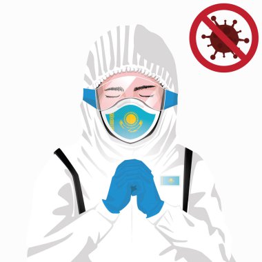 Covid-19 veya Coronavirus konsepti. Kazakistan sağlık personeli koruyucu giysiler içinde maske takıyor ve Kazakistan 'daki Covid-19 virüs salgınına karşı dua ediyor. Kazakistan adamı ve Kazakistan bayrağı. Pandemik korona virüsü