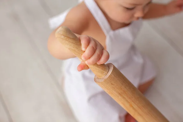 Little baby chef in apron. — Stock Photo, Image