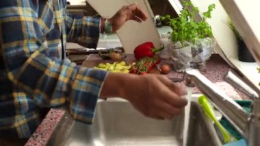 Low view person making healthy meal at home