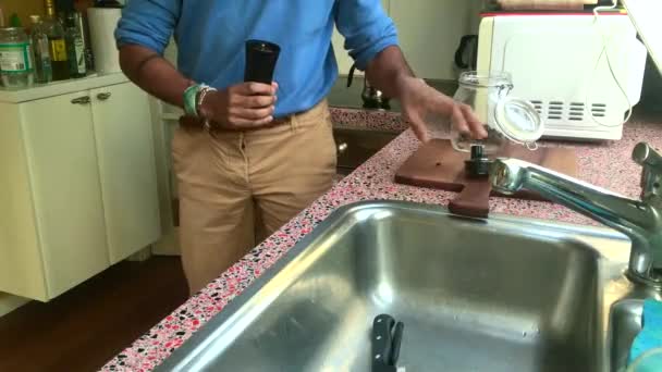 Person Grinding Coffee Beans Home — Stock Video