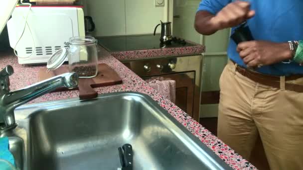 Person Grinding Coffee Beans Home — Stock Video