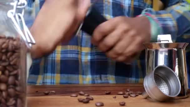 Person Manually Grinding Roasted Coffee Beans Home — Stock Video