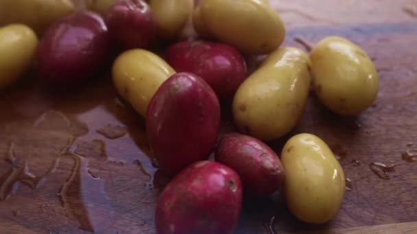 Person Hands Preparing Organic Baby Potatoes Wooden Cutting Board Kitchen — Stock Video