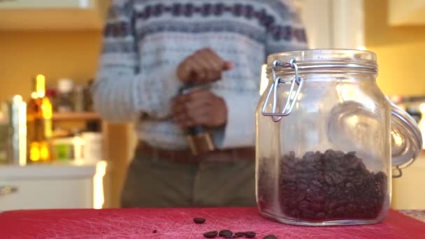 Man Manually Grinding Roasted Coffee Beans Home — Stock Video